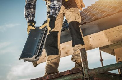 roofer-with-ceramic-tiles-56PNTAM.jpg
